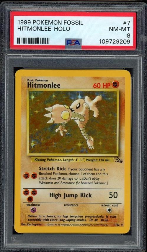 Hitmonlee Holo PSA 8 - 7/62 - Fossil 1999, Hobby en Vrije tijd, Verzamelkaartspellen | Pokémon, Zo goed als nieuw, Losse kaart