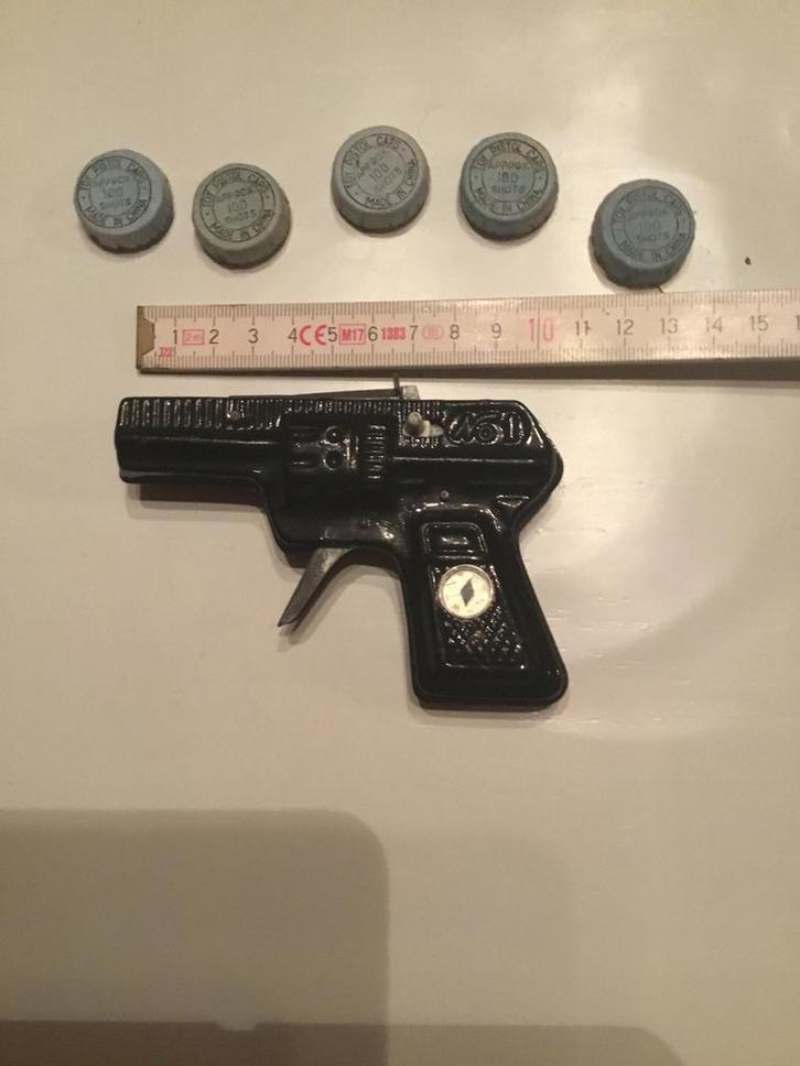 Blikken revolver met kompas, Antiek en Kunst, Antiek | Speelgoed, Ophalen of Verzenden