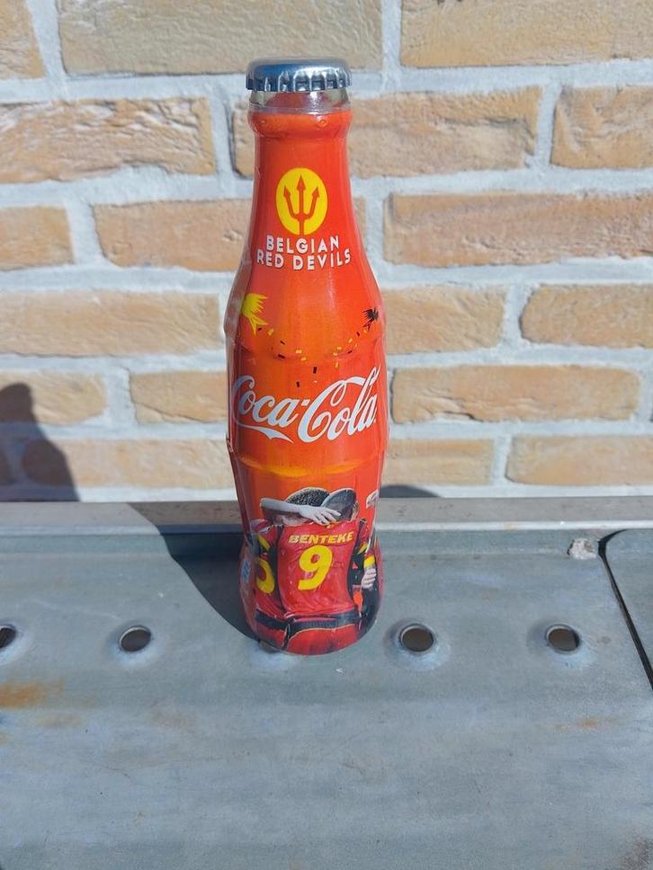 Zeven Coca-Cola flessen, Verzamelen, Merken en Reclamevoorwerpen, Nieuw, Overige typen, Ophalen