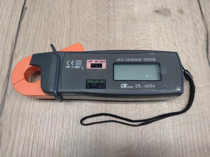 Lutron - DL6054 (compteur de courant de fuite), Bricolage & Construction, Instruments de mesure, Neuf, Électricité, Enlèvement ou Envoi