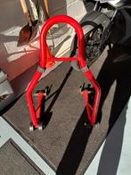 Bequille moto arriere, Ophalen