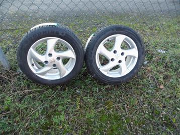2 WIELEN 4 X 108 X 15 GEMONTEERD MET NIEUWE BANDEN  beschikbaar voor biedingen
