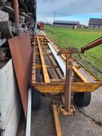 Platte kar met volle banden, Enlèvement