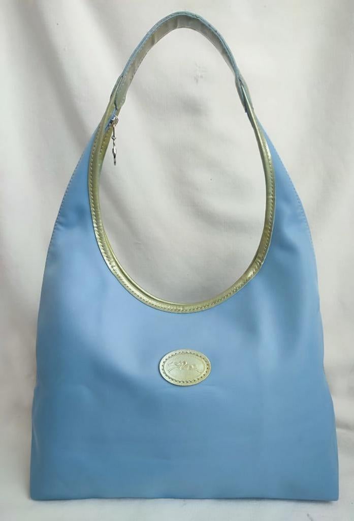 Longchamp bleu clair et doré, Bleu