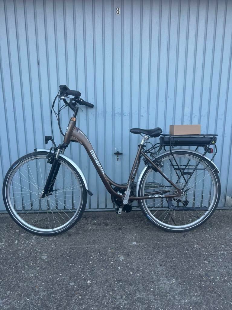 MINERVA ELEKTRISCHE FIETS MET MIDDENMOTOR, Fietsen en Brommers, Ophalen, Zo goed als nieuw