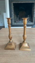 Koperen kandelaars, Ophalen