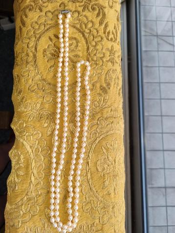 Collier de perles 62 cm diamètre perles 7 mm poids 67 gr.