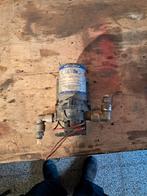 Waterpomp camper 12 volt, Ophalen