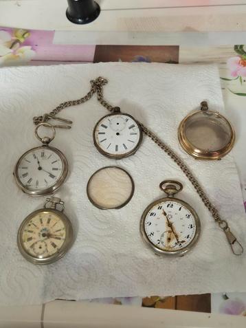 Horlogesets met zak, cilinders, ketting en koffer
 beschikbaar voor biedingen
