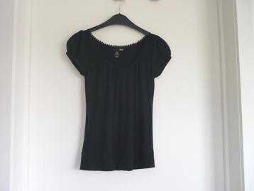 Zwart T-shirt top met bolletjes kraag van H&M Maat XS beschikbaar voor biedingen