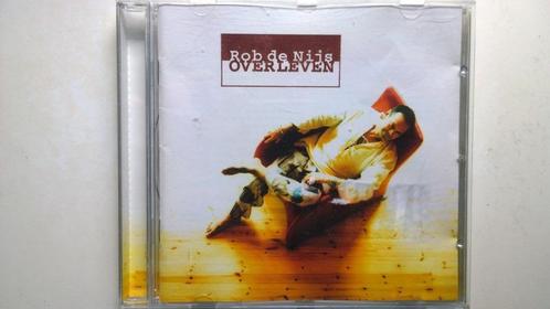 Rob de Nijs - Overleven, CD & DVD, CD | Néerlandophone, Comme neuf, Pop, Envoi