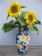 Vaas met zonnebloemdecor, Ophalen