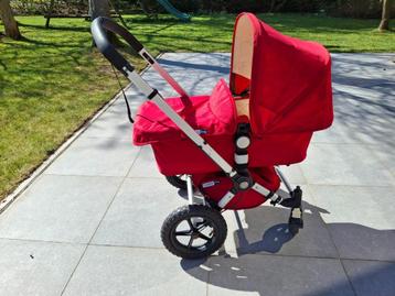 Kinderwagen Bugaboo met reiswieg en kinderzitje en plankje beschikbaar voor biedingen