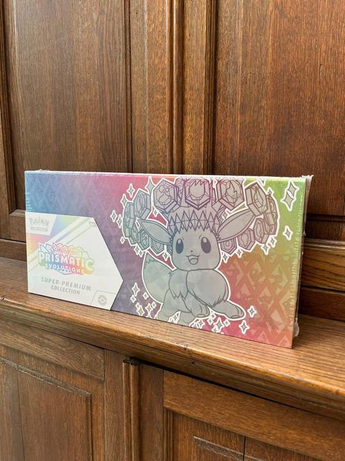 Pokemon - Prismatic Evolutions Super Premium Collection, Hobby en Vrije tijd, Verzamelkaartspellen | Pokémon, Nieuw, Ophalen of Verzenden