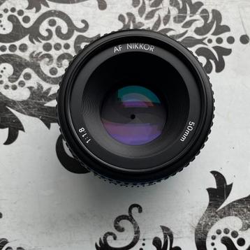 Nikon AF Nikkor 50mm f1.8 *neuf disponible aux enchères