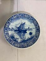 Delfts blauw bord met schip, Ophalen