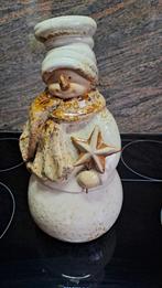 Kerstman in keramiek, Ophalen