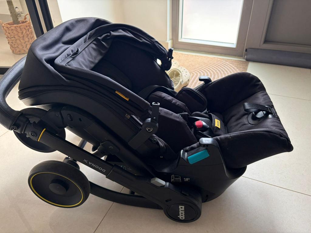 Doona x met isofix en voetenzak, Ophalen, Zo goed als nieuw