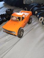 Axial SCX24 1967 Chevrolet C10 RTR - Oranje, Hobby en Vrije tijd, Modelbouw | Radiografisch | Auto's, Ophalen of Verzenden
