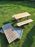Picknicktafel met zandbak, Ophalen