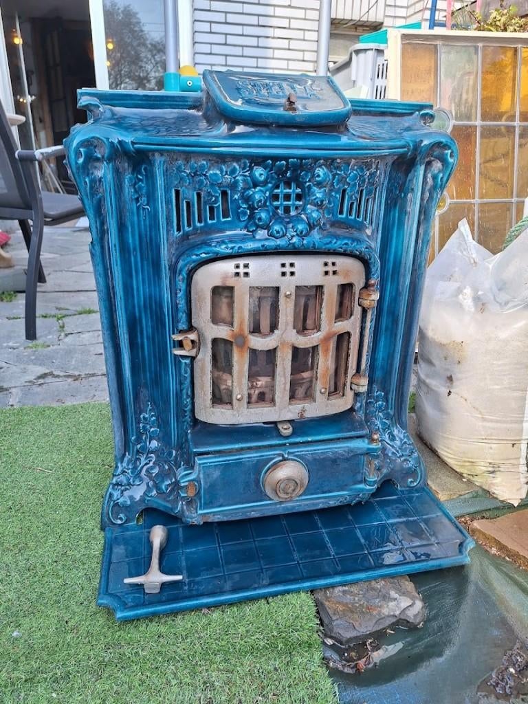 antieke Stella gietijzeren kachel, Antiek en Kunst, Curiosa en Brocante, Ophalen