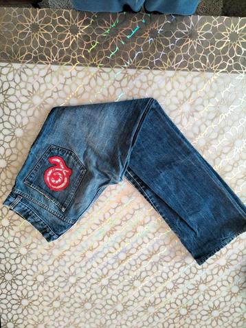 Pantalon en jean de la marque 'Alexander McQueen', Enlèvement, Porté