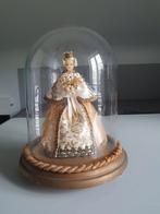 Globe met wassen beeldje, Ophalen