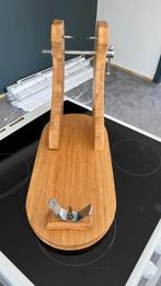 Houder voor beenham, Ophalen