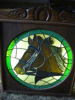 Paardenhoofd in loodglas, Ophalen