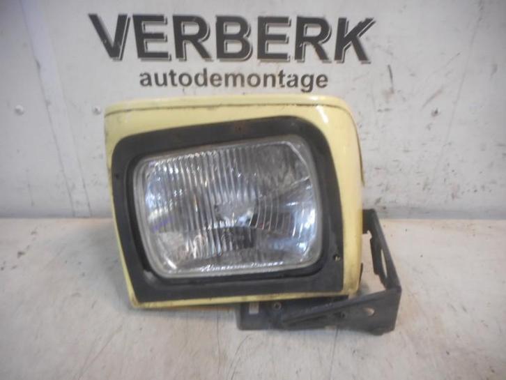 KOPLAMP HOUDER LINKS Volvo 480 (01-1986/07-1996), Auto-onderdelen, Verlichting, Volvo, Gebruikt