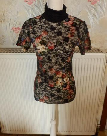 (40)- blouse femme t.36 noire beschikbaar voor biedingen