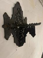 Zware gietijzeren console om religieus beeld op te zetten, Ophalen