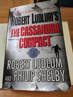 Robert Ludlum & Philip Shelby - The Cassandra Compact, Utilisé, Robert Ludlum, Enlèvement ou Envoi