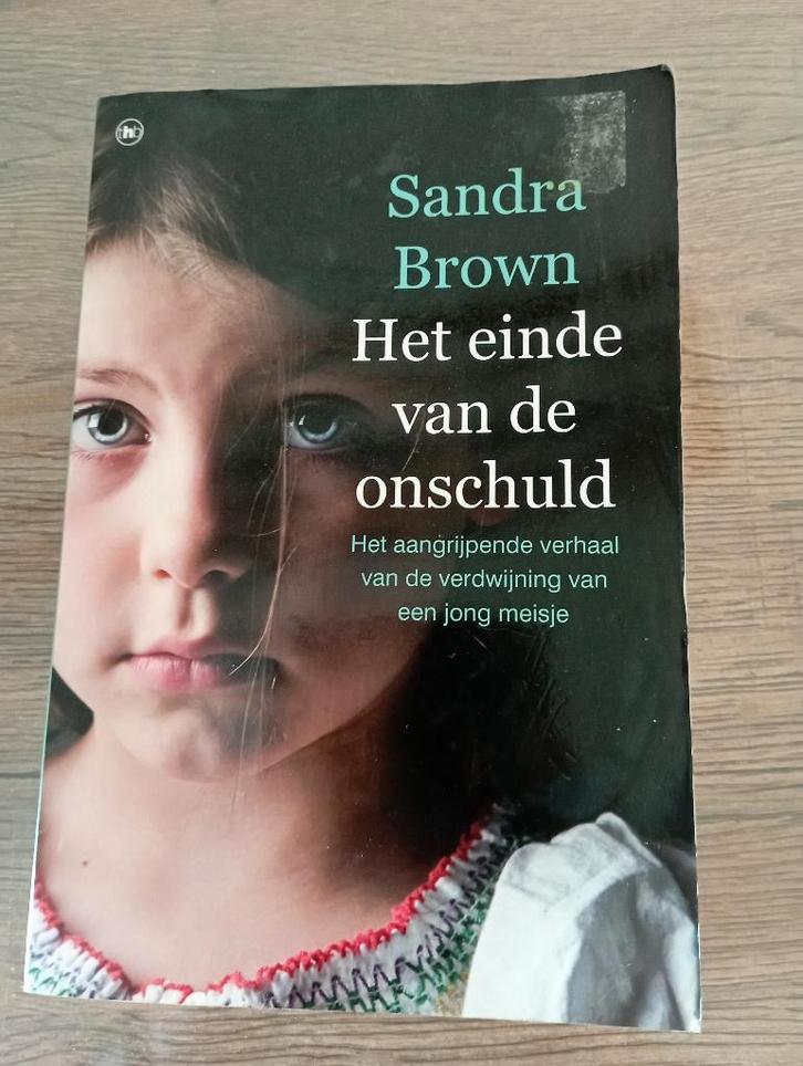 het einde van de onschuld - Sandra Brown, Livres, Romans, Comme neuf, Enlèvement ou Envoi
