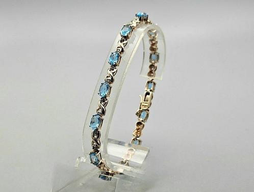 Gouden Vintage tennisarmband met diamant en topaas. 2025/46., Handtassen en Accessoires, Armbanden, Zo goed als nieuw, Goud, Blauw