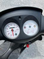 Scooter met wienig km, Ophalen, Zo goed als nieuw
