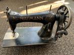 Naumann oude naaimachine, Ophalen