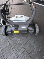 Elektrische verticuteermachine, Ophalen