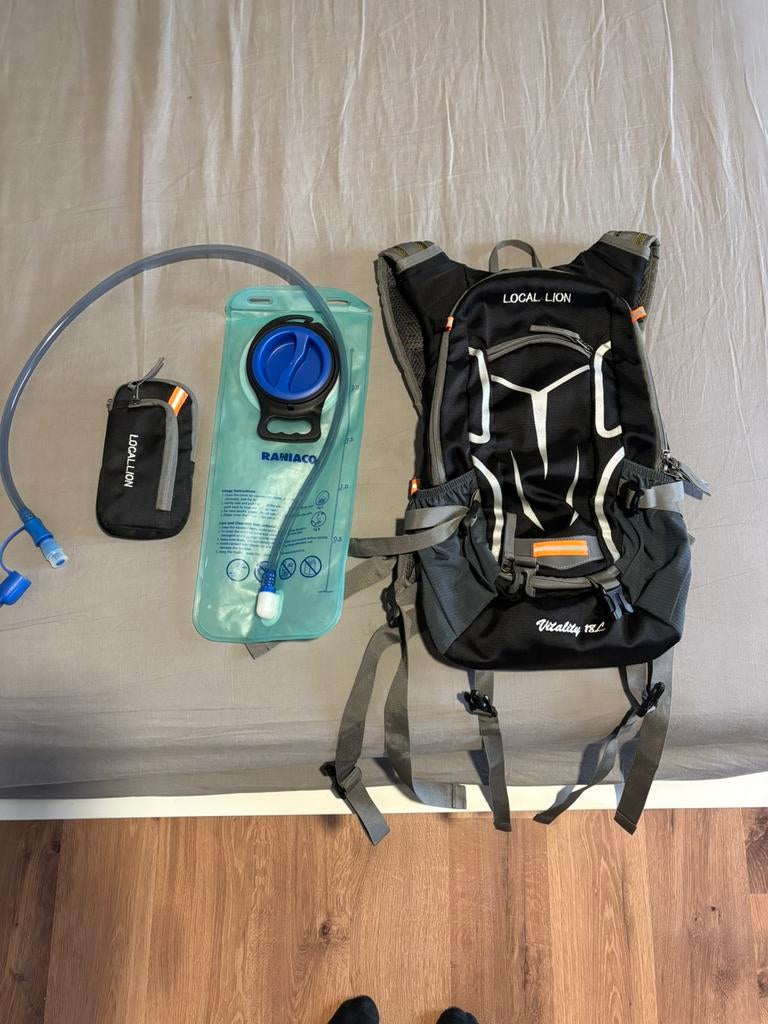 Sac d'hydratation Local Lion + poche à eau - très bon état, Enlèvement ou Envoi, Utilisé, Autres types