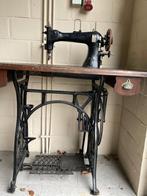 Antieke gietijzeren naaimachine, Enlèvement