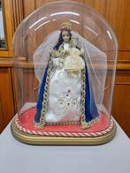 Een globe met Maria in goede staat, Ophalen