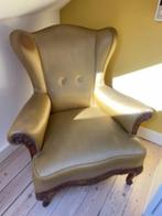 Antieke fauteuil met vleugels, Ophalen