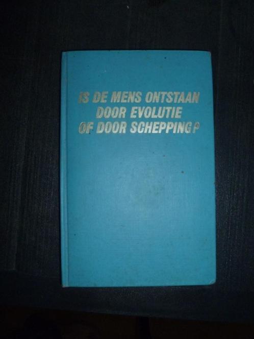 Is de mens ontstaan door evolutie of door schepping?, Boeken, Overige Boeken, Zo goed als nieuw, Ophalen of Verzenden