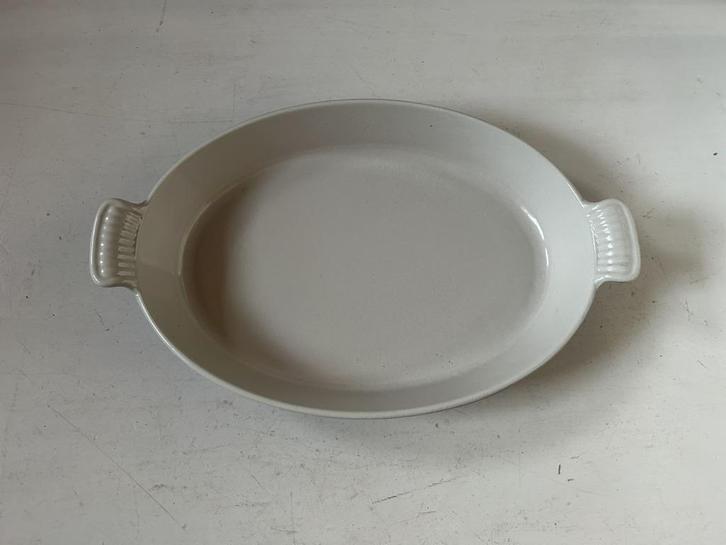 Le Creuset ovaal ovenschaal 36 cm, bruin - nieuw, Huis en Inrichting, Keuken | Potten en Pannen, Gebruikt, Overige typen, Gietijzer