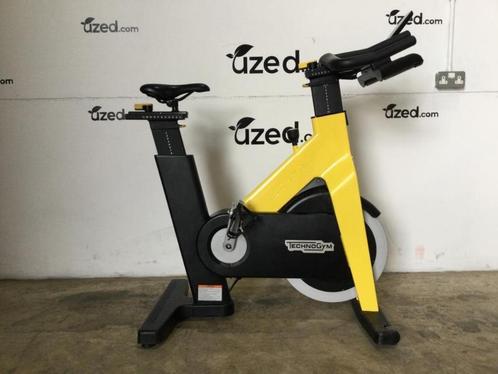 Lot de 5 vélos spinning - Technogym group cycle jaune sans c, Sport en Fitness, Fitnessmaterialen, Gebruikt, Overige typen, Benen