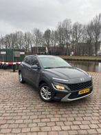 Hyundai Kona 1.0 T-gdi 48V 120pk 2023 Grijs, Auto's, Voorwielaandrijving, Stof, 4 cilinders, 124 g/km