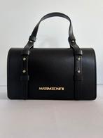 Liquidatie winkel merkhandtassen, Ophalen