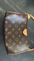 Louis Vuitton, Ophalen, Zo goed als nieuw