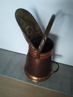 Koperen kolen bak kan ook dienst doen als paraplu bak, Ophalen