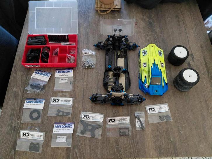 1/10 associated roller buggy B64 + reserveonderdelen, Hobby en Vrije tijd, Modelbouw | Radiografisch | Auto's, Gebruikt, Auto offroad